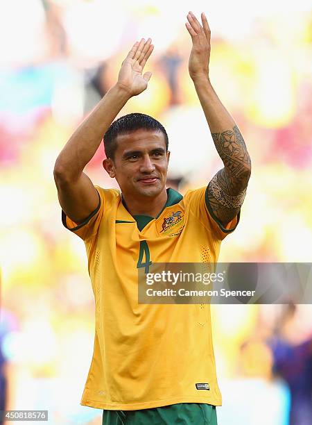 Tim Cahill of Australia acknowledges the fans after being defeated by the Netherlands 3-2 during the 2014 FIFA World Cup Brazil Group B match between...
