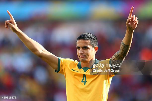 Tim Cahill of Australia acknowledges the fans after being defeated by the Netherlands 3-2 during the 2014 FIFA World Cup Brazil Group B match between...