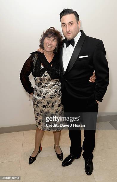 Janis Winehouse with her son Alex attend the Amy Winehouse Foundation Ball at the Dorchester Hotel on November 20, 2013 in London, England.