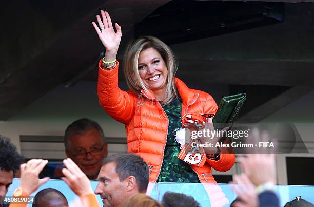 Queen Maxima of the Netherlands waves during the 2014 FIFA World Cup Brazil Group B match between Australia and Netherlands at Estadio Beira-Rio on...