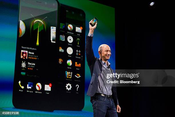 Jeff Bezos, chief executive officer of Amazon.com Inc., unveils the Fire Phone during an event at Fremont Studios in Seattle, Washington, U.S., on...