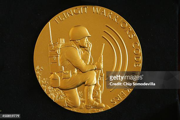 The Congressional Gold Medal presented to the Tlingit Warriors code talkers is displayed during a ceremony in Emancipation Hall at the U.S. Capitol...