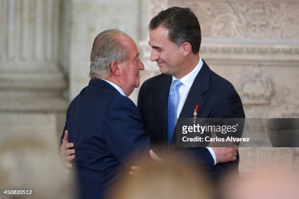 Prince Felipe of Spain and King Juan Carlos of Spain attend the official abdication ceremony at the Royal Palace on June 18, 2014 in Madrid, Spain.