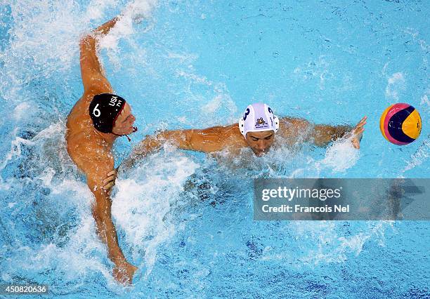 Norbert Madaras of Hungary competes for the ball wit Coner Cleary of the UAS during the Fina Men's Water Polo World League Super Final Group Match...