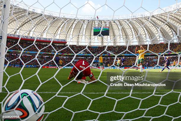 Memphis Depay of Netherlands celebrates with team-mate Robin van Persie after scoring their third goal during the 2014 FIFA World Cup Brazil Group B...