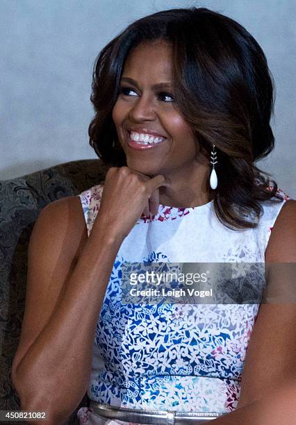 Michelle Obama attends a special naturalization ceremony at The National Archives on June 18, 2014 in Washington, DC.