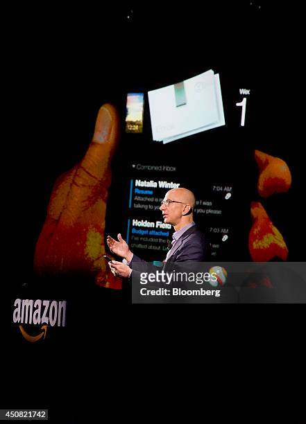 Jeff Bezos, chief executive officer of Amazon.com Inc., unveils the Fire Phone during an event at Fremont Studios in Seattle, Washington, U.S., on...