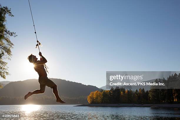 170 Man Swinging On Rope Into Water Stock Photos, High-Res Pictures, and  Images - Getty Images