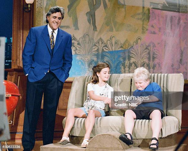 Episode 744 -- Pictured: Host Jay Leno with audience members during the "Summer Products" skit on August 4, 1995 --
