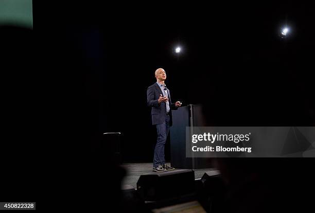 Jeff Bezos, chief executive officer of Amazon.com Inc., unveils the Fire Phone during an event at Fremont Studios in Seattle, Washington, U.S., on...