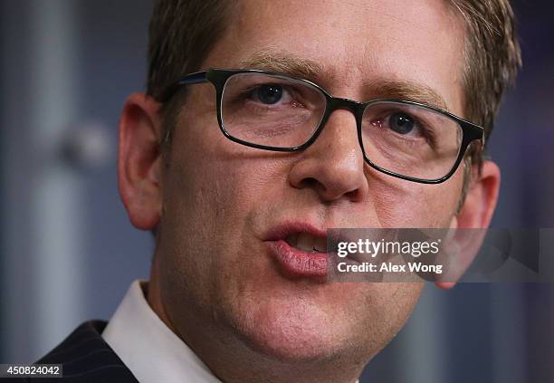 White House Press Secretary Jay Carney speaks during his last White House news briefing at the James Brady Press Briefing Room of the White House...