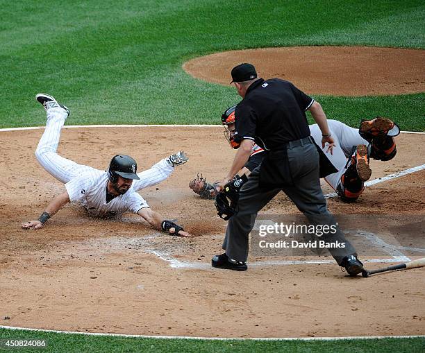 Adam Eaton of the Chicago White Sox is tagged out by Buster Posey of the San Francisco Giants during the third inning on June 18, 2014 at U.S....