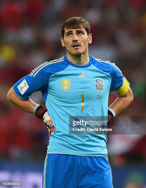 Dejected Iker Casillas of Spain looks on during the 2014 FIFA World Cup Brazil Group B match between Spain and Chile at Maracana on June 18, 2014 in...