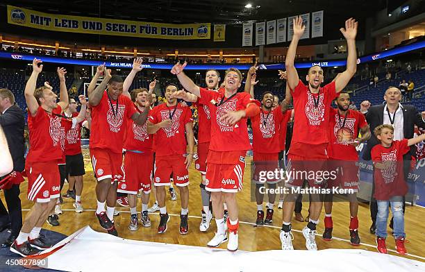 The players of Muenchen show their delight after winning the Beko BBL playoff final game 4 between Alba Berlin and Bayern Muenchen at O2 World on...