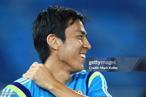 Makoto Hasebe laughs during a Japan training session at the Dunas Arena in Natal on June 18, 2014 in Natal, Rio Grande do Norte.