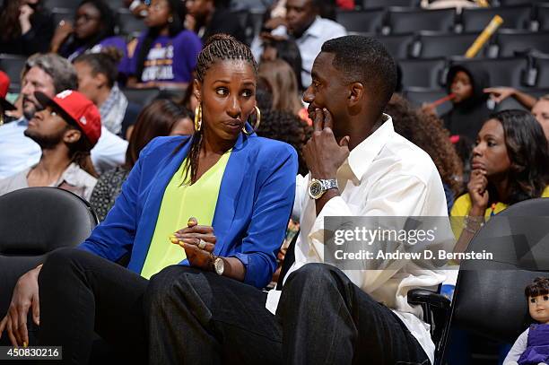 Former WNBA player Lisa Leslie attends a game with her husband Michael Lockwood at STAPLES Center on June 17, 2014 in Los Angeles, California. NOTE...