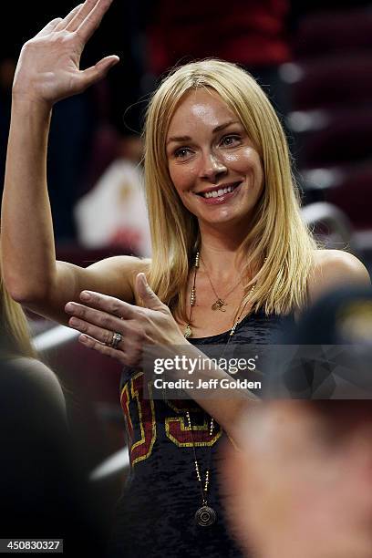 Model Amanda Enfield smiles as she waves to her husband after the home opening victory in the game between the Cal State Northridge Matadors and the...