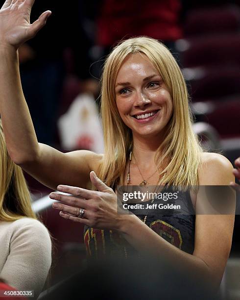 Model Amanda Enfield smiles as she waves to her husband after the home opening victory in the game between the Cal State Northridge Matadors and the...