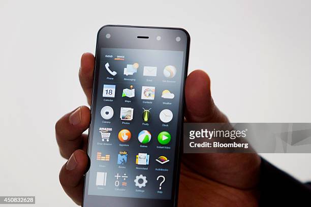 The Amazon.com Inc. Fire Phone is displayed for a photograph during an event in Seattle, Washington, U.S., on Wednesday, June 18, 2014. Amazon.com...