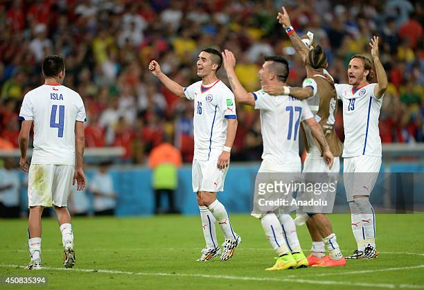 Chile's Medel , Fuenzalida , Isla and Gutierrez celebrate victory after the 2014 FIFA World Cup Brazil Group B match between Spain and Chile at...