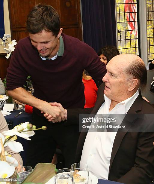 Casey Affleck and Robert Duvall attend a luncheon celebrating the release of "Out Of The Furnace" at Explorers Club on November 20, 2013 in New York...