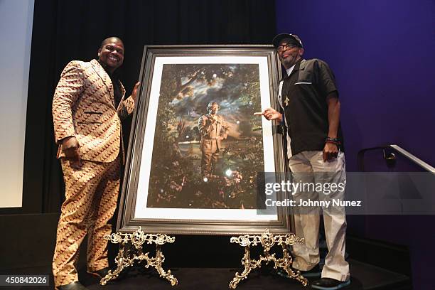 Artist, influencer Kehinde Wiley and director, producer Spike Lee unveil Lee's portrait by Wiley onstage during an evening with Kehinde Wiley & Spike...