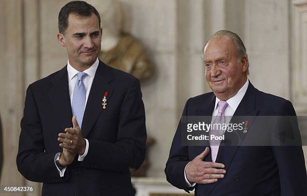 Prince Felipe of Spain and King Juan Carlos of Spain attend the official abdication ceremony at the Royal Palace on June 18, 2014 in Madrid, Spain....