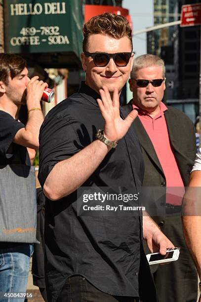 Singer Sam Smith leaves the "Late Show With David Letterman" taping at the Ed Sullivan Theater on June 18, 2014 in New York City.