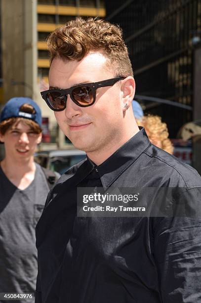 Singer Sam Smith enters the "Late Show With David Letterman" taping at the Ed Sullivan Theater on June 18, 2014 in New York City.