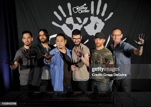 Musicians Mike Shinoda, Rob Bourdon, Joe Hahn, Brad Delson, Dave 'Phoenix' Farrell and Chester Bennington of Linkin Park are inducted into the...