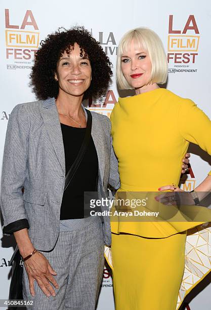 Los Angeles Film Festival director Stephanie Allain and writer/director Gren Wells, wearing a Jaeger-LeCoultre watch attend the premiere of "The Road...