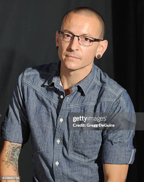 Singer Chester Bennington attends Linkin Park's induction into the Rockwalk at Guitar Center on June 18, 2014 in Hollywood, California.