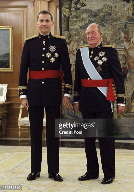 King Felipe VI of Spain and King Juan Carlos attend a ceremony in the Hearing Room of Zarzuela Palace prior to the King's official coronation...
