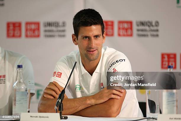 Novak Djokovic of Serbia talks during a press conference to announce a UNIQLO sponsorship agreement for wheelchair tennis during day three of The...