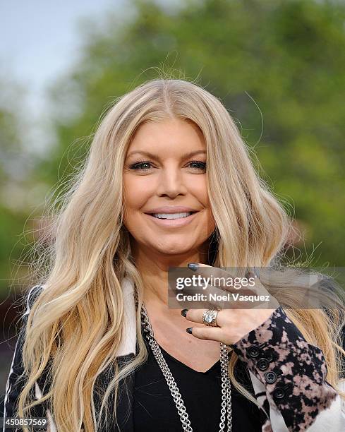 Fergie visits "Extra" at Universal Studios Hollywood on November 20, 2013 in Los Angeles, California.