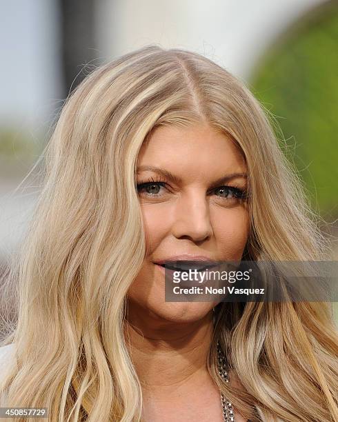Fergie visits "Extra" at Universal Studios Hollywood on November 20, 2013 in Los Angeles, California.