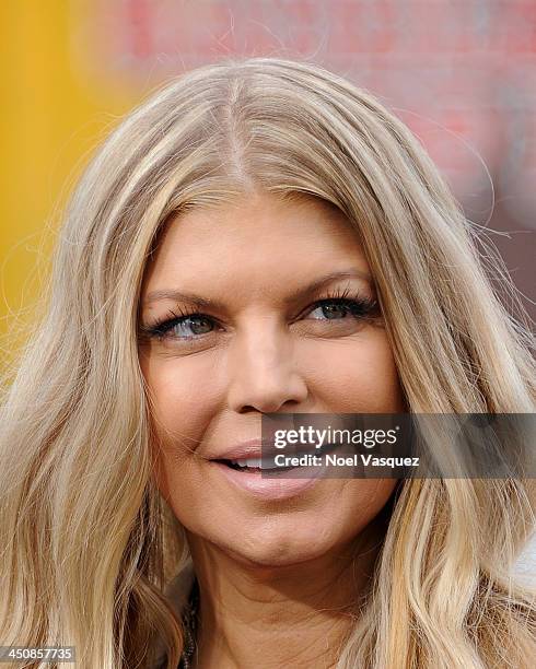 Fergie visits "Extra" at Universal Studios Hollywood on November 20, 2013 in Los Angeles, California.