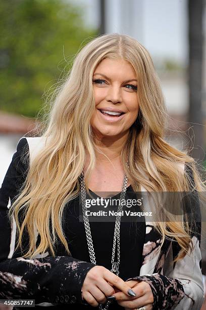 Fergie visits "Extra" at Universal Studios Hollywood on November 20, 2013 in Los Angeles, California.