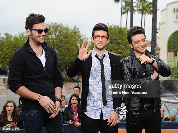 Ignazio Boschetto, Piero Barone and Gianluca Ginoble of Il Volo visit "Extra" at Universal Studios Hollywood on November 20, 2013 in Los Angeles,...