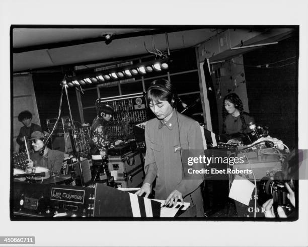 The Japanese band Yellow Magic Orchestra on stage, 1979. Haruomi Hosono in center, Yukihiro Takahashi on the far left, Ryuichi Sakamoto on second...