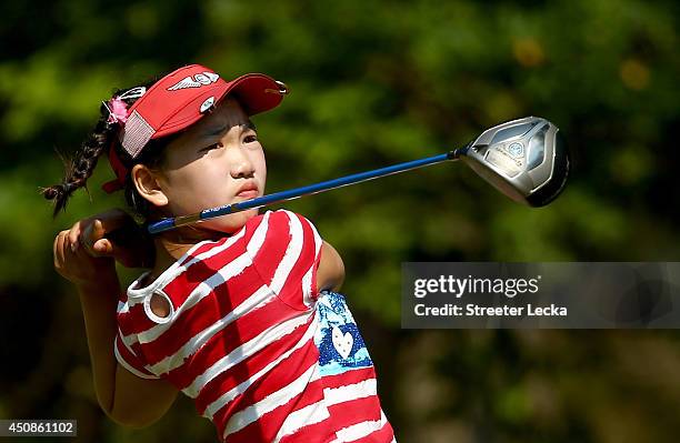 Eleven-year old Amateur Lucy Li of the United States watches a tee shot on the third hole during the first round of the 69th U.S. Women's Open at...