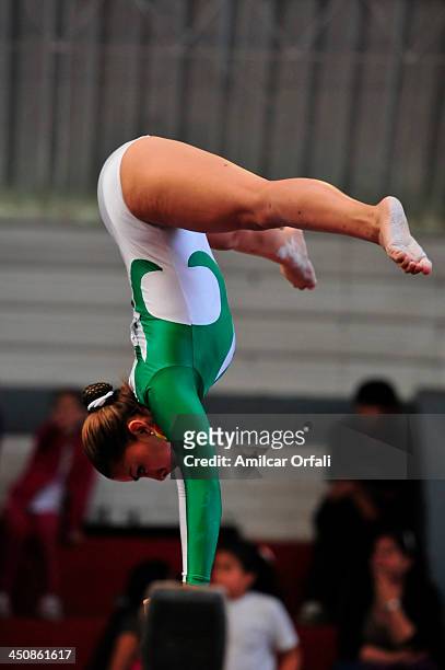 Yorgeley Portales VArgas of Bolivia competes in balance beam as part of the woman's Gymnastics All Around part of the XVII Bolivarian Games Trujillo...