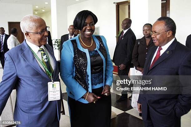 South Sudan's Water Minister Jemma Nunu Kumba shares a laugh with her Ethiopian counterpart Alemayehu Tegenu and her Tanzanian counterpart Jumanne...