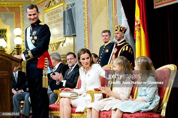 King Felipe VI of Spain attends along side Queen Letizia of Spain, Princess Leonor, Princess of Asturias and Princess Sofia of Spain during his...