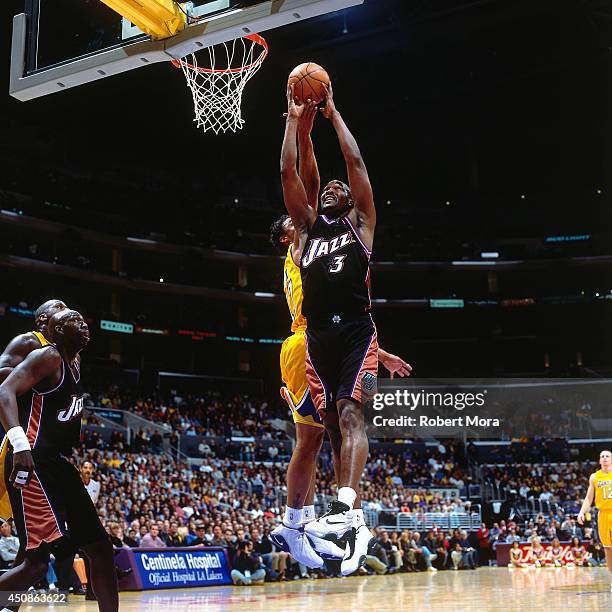 Bryon Russell of the Utah Jazz grabs a rebound against the Los Angeles Lakers on January 3, 2001 at Staples Center in Los Angeles, CA. NOTE TO USER:...