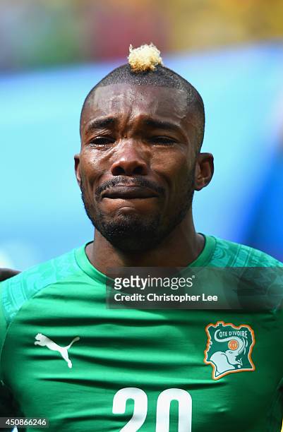 Die Serey of the Ivory Coast gets emotional during his National Anthem during the 2014 FIFA World Cup Brazil Group C match between Colombia and Cote...
