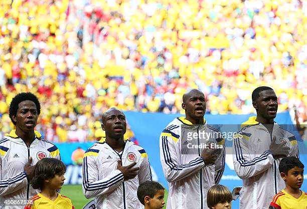 Carlos Sanchez, Pablo Armero Victor Ibarbo and Cristian Zapata of Colombia sing the National Anthem prior to the 2014 FIFA World Cup Brazil Group C...