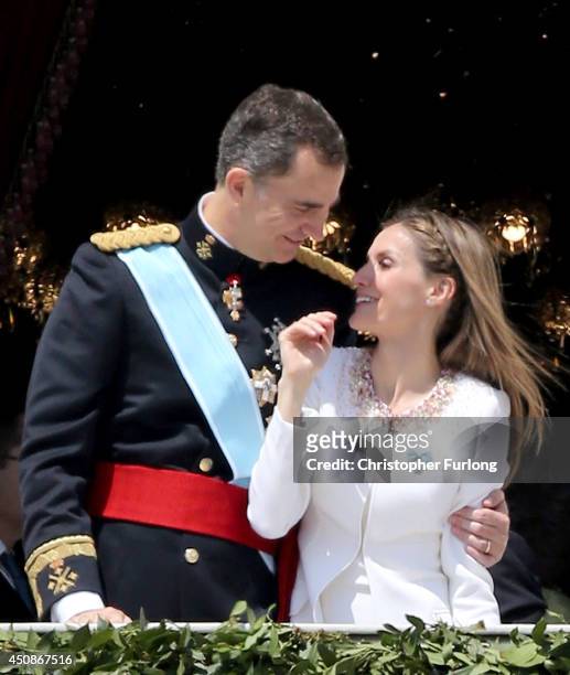 King Felipe VI of Spain and Queen Letizia of Spain appear at the balcony of the Royal Palace during the King's official coronation ceremony on June...