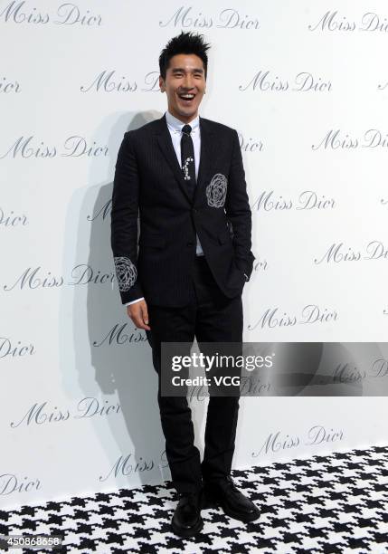 Actor Mark Chao attends Miss Dior exhibition at Shanghai Urban Sculpture Center on June 19, 2014 in Shanghai, China.