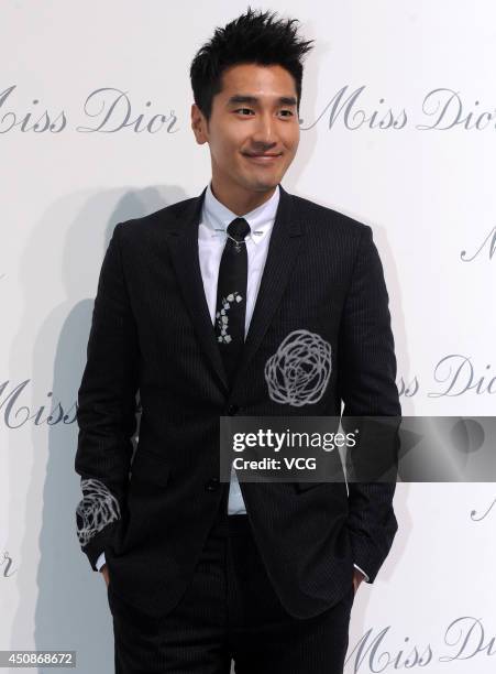 Actor Mark Chao attends Miss Dior exhibition at Shanghai Urban Sculpture Center on June 19, 2014 in Shanghai, China.